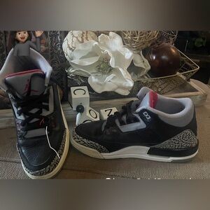 Black, red and grey Jordan’s